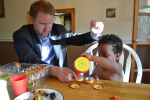 serving Daddy some tea